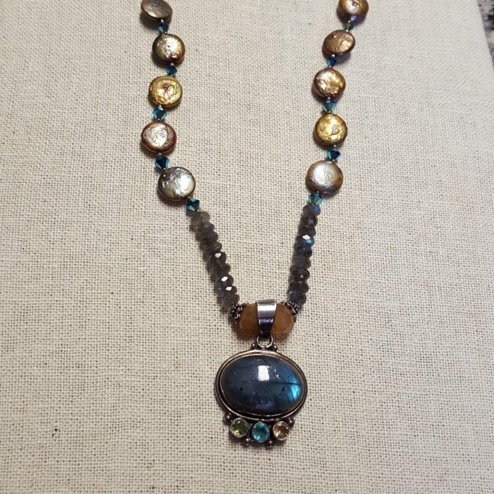Handmade necklace with sterling silver pendant